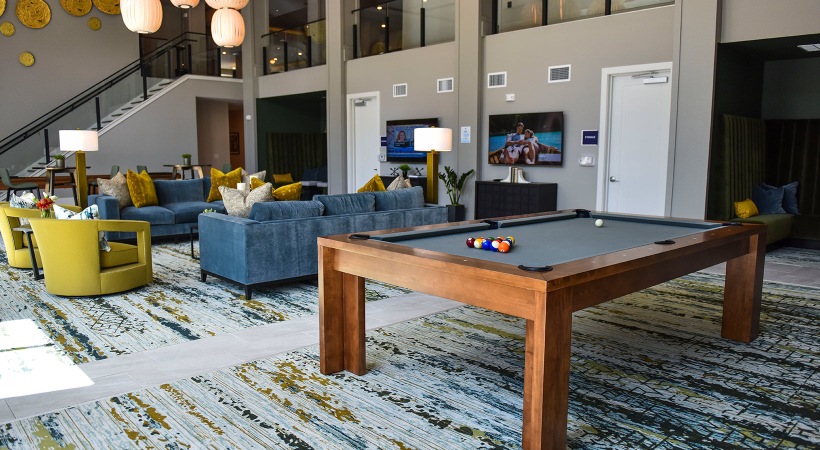 Clubhouse Spacious and well lit clubhouse with plenty of seating and shuffle board and billiards tables.