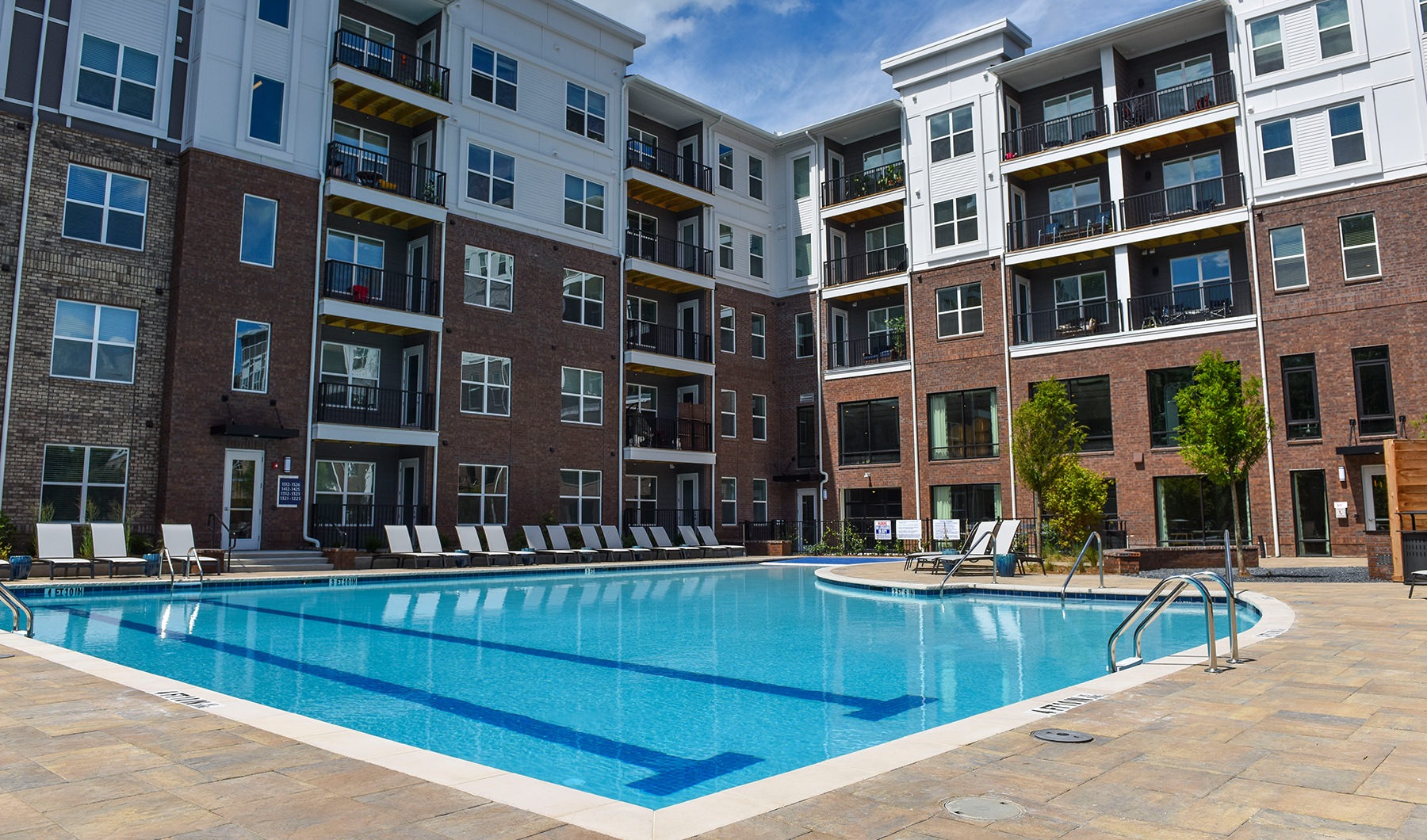 Swimming Pool  Spacious sparkling pool with sundecks and cabanas for lounging.